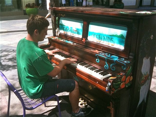 Parker plays a little "Linus & Lucy" for the locals